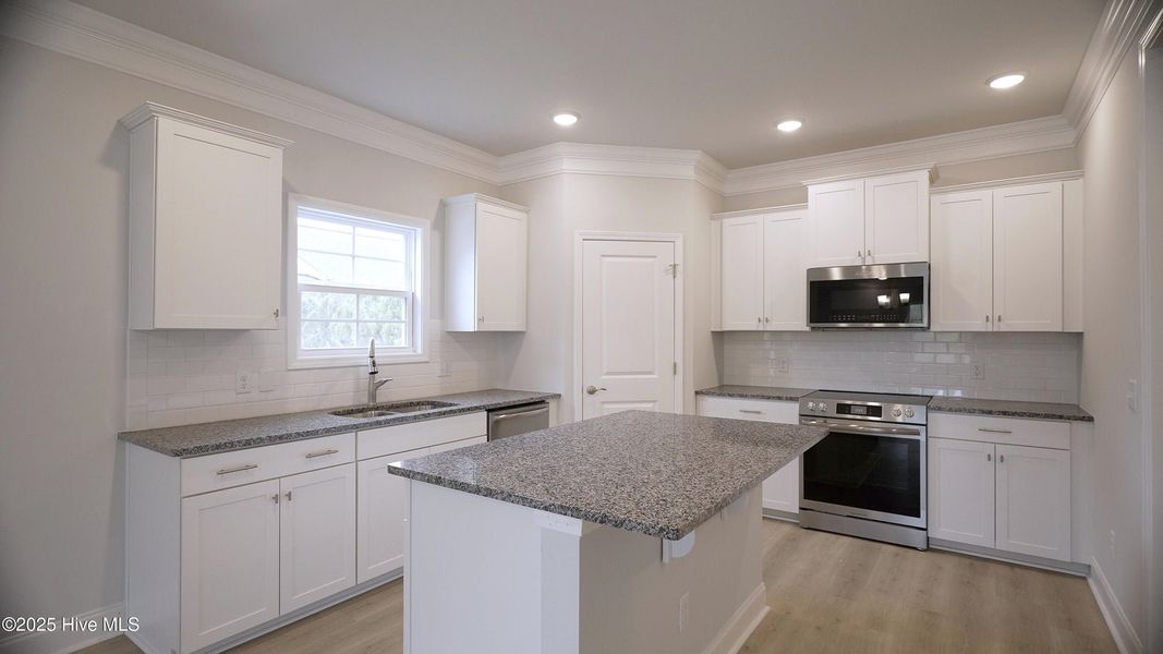 Furnished interior view inside a new home in Palmetto Creek, Bolivia (Image 4).