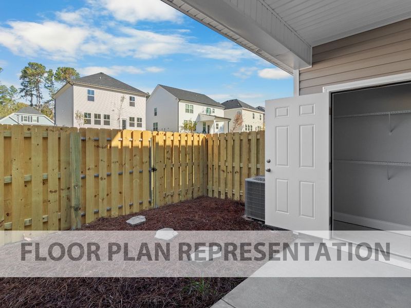 Exterior details and patio area of a home in Caroleton Townhomes, Grovetown (Image 3). Exterior details and patio area of a home in Caroleton Townhomes, Grovetown (Image 3).