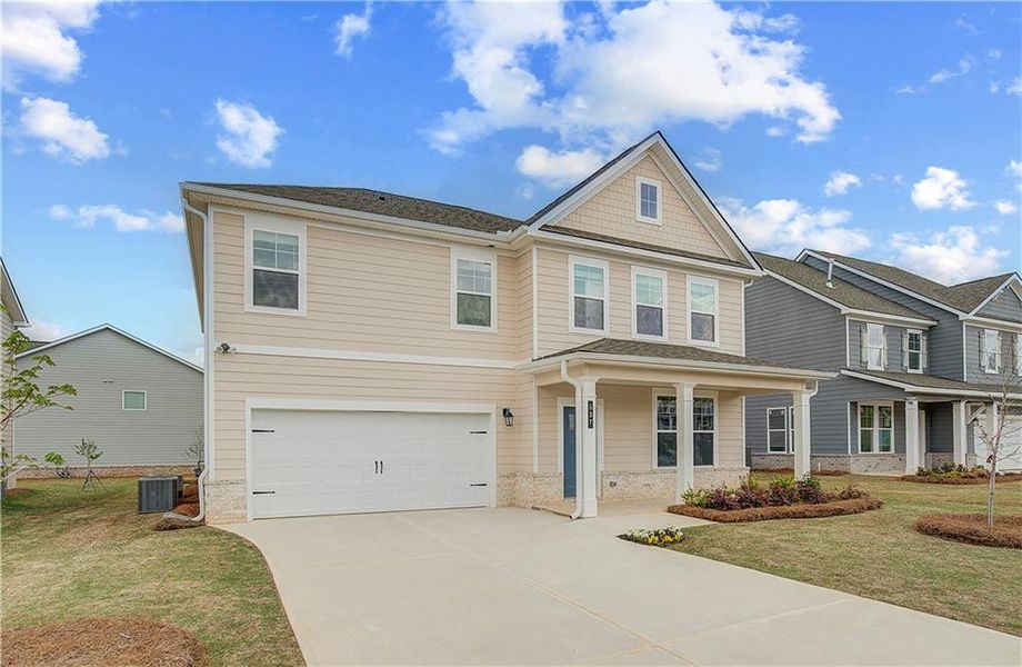 Front exterior of a new home in Cooper Park, McDonough, GA, highlighting curb appeal (Image 18).