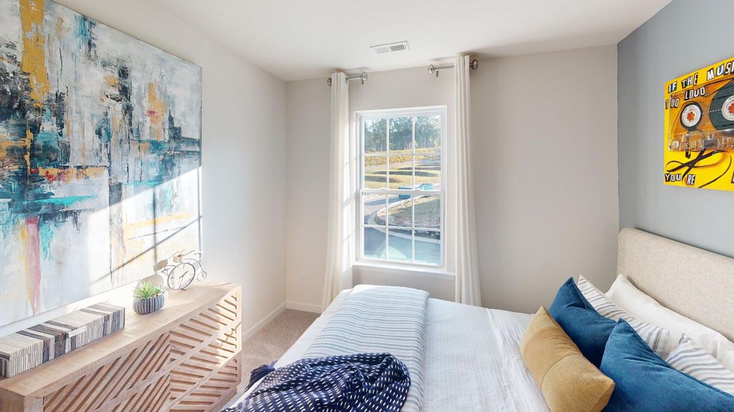 Furnished interior view inside a new home in Cardinal Creek, Charlotte (Image 27).