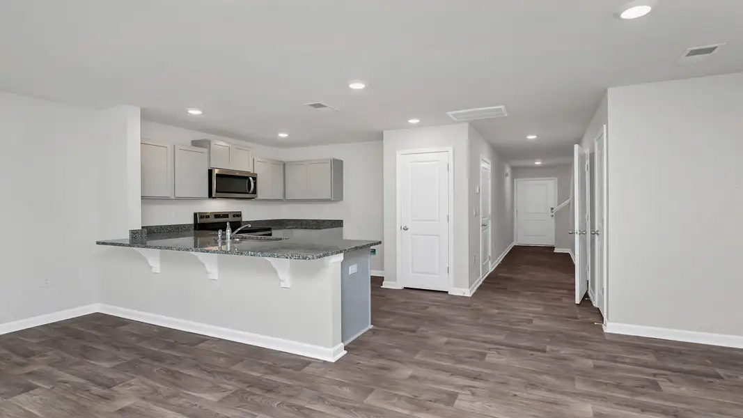 Furnished interior view inside a new home in Hunter's Branch Townhomes, Hopkins (Image 4).
