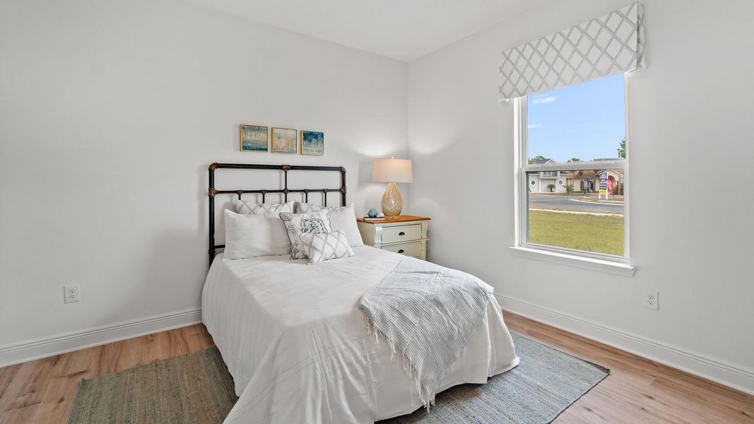 Representative furnished interior of a home built from the McKenzie by D.R. Horton in Holley Grove at Peach Creek - Waterfront Homes, Santa Rosa Beach (Image 28).