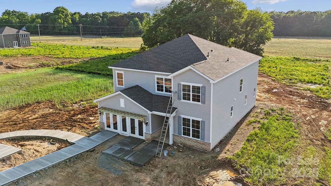 Front exterior of a new home in , Locust, NC, highlighting curb appeal (Image 1). Front exterior of a new home in , Locust, NC, highlighting curb appeal (Image 1).