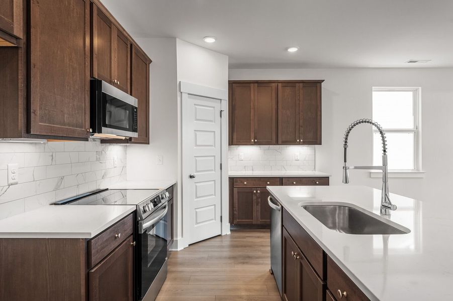 Representative furnished interior of a home built from the The Cottonwood E by Davidson Homes LLC in Woods Crossing, Gallatin (Image 9).