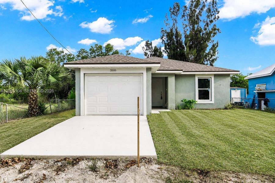Front exterior of a new home in , Fort Myers, FL, highlighting curb appeal (Image 2). Front exterior of a new home in , Fort Myers, FL, highlighting curb appeal (Image 2).