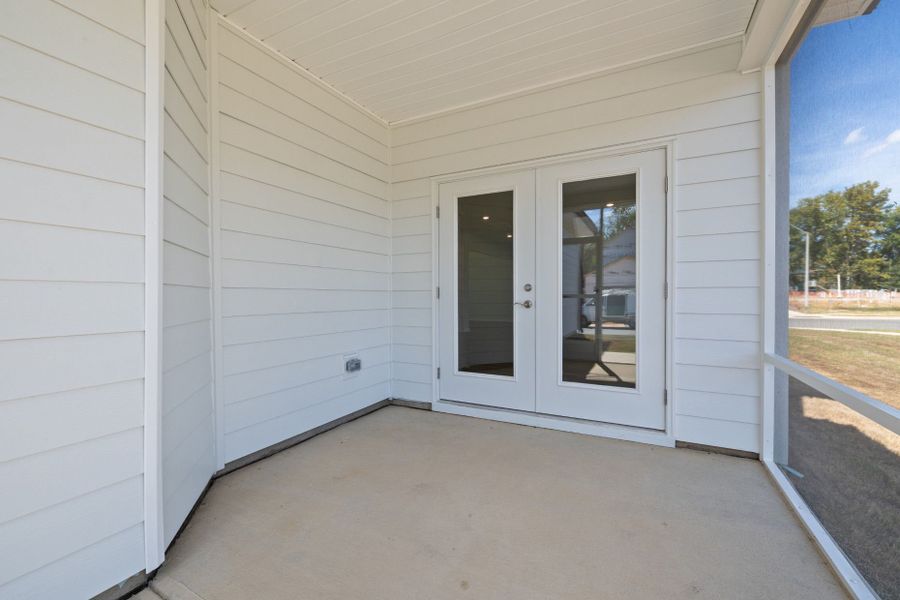 Exterior details and patio area of a home in Saunders Farm, Willow Spring (Image 4). Exterior details and patio area of a home in Saunders Farm, Willow Spring (Image 4).