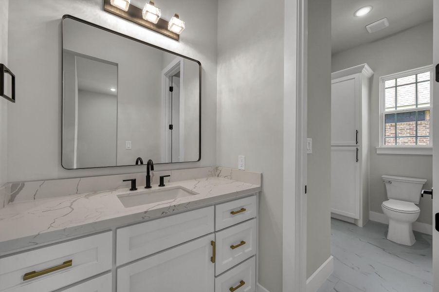 The secondary bedrooms 2 & 3 share a Jack and Jill bathroom, each with their own private sink areas for privacy and convenience. The secondary bedrooms 2 & 3 share a Jack and Jill bathroom, each with their own private sink areas for privacy and convenience.