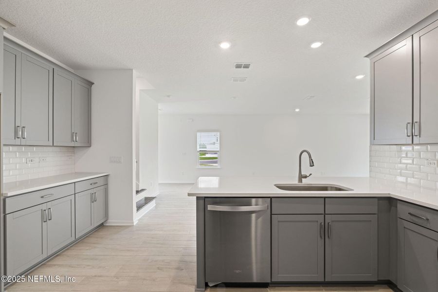 Furnished interior view inside a new home in Beacon Lake, St. Augustine (Image 6).