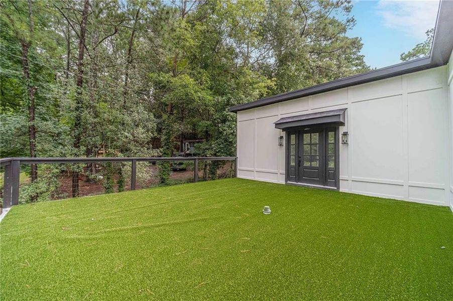 Front exterior of a new home in , Flowery Branch, GA, highlighting curb appeal (Image 2).
