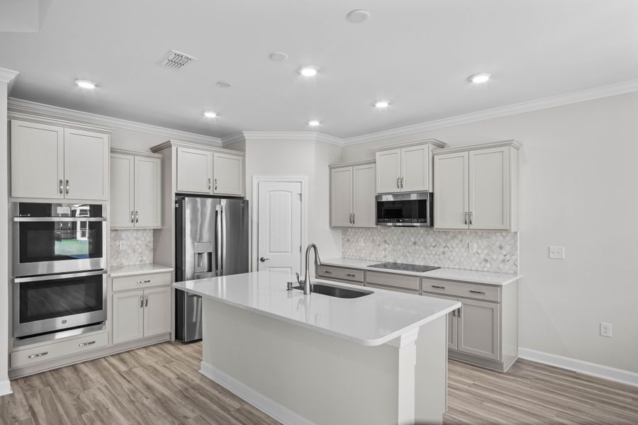 Furnished interior view inside a new home in Coastal Club of the Carolinas, Calabash (Image 5).