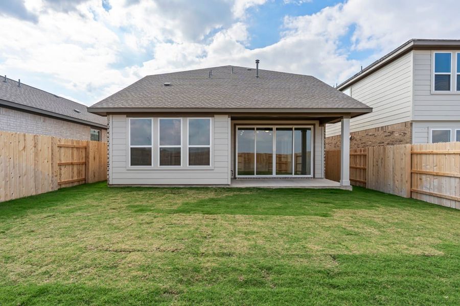 Exterior details and patio area of a home in Terrace Collection at Lariat, Liberty Hill (Image 32).