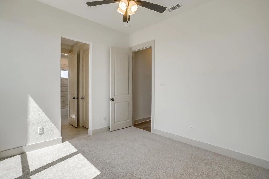 Representative unfurnished interior of a home built from the The Carley by Elmwood Custom Homes in Matthews Farm, Venus (Image 47).