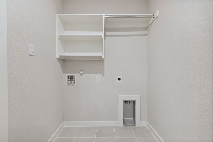 Utility Room in the Mesquite home plan by Trophy Signature Homes – REPRESENTATIVE PHOTO