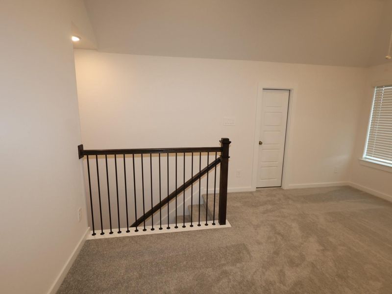 Spacious, unfurnished interior of a new home in Pinewood at Grand Texas, New Caney (Image 23).