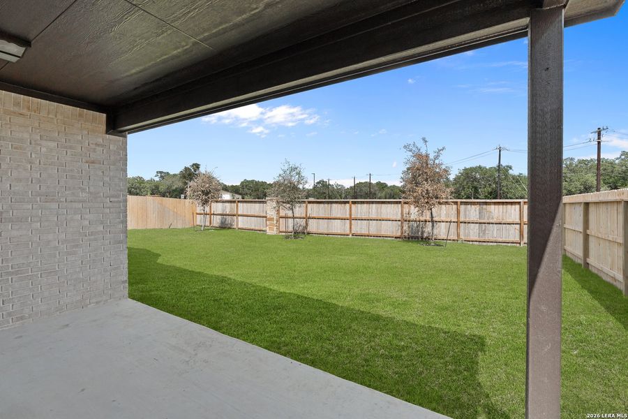 Exterior details and patio area of a home in Bison Ridge, San Antonio (Image 3).