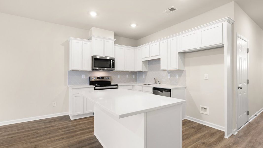 Furnished interior view inside a new home in The Gables at Agricultural Village, Perry (Image 7).