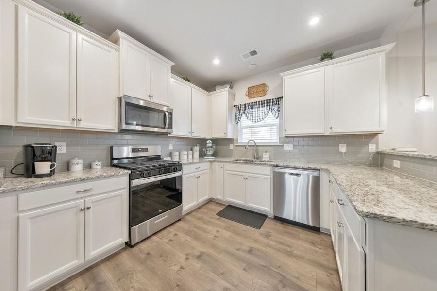 Furnished interior view inside a new home in Old Lost Mountain Estates, Powder Springs (Image 32).
