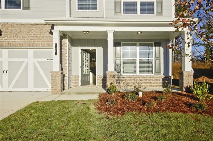 Exterior details and patio area of a home in Clark Farms, Flowery Branch (Image 3).