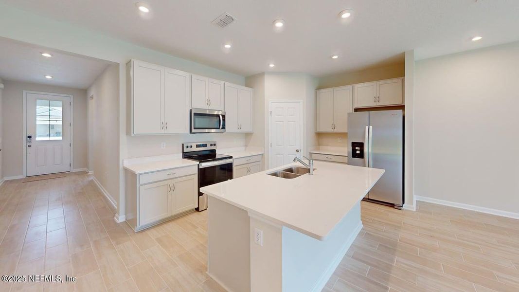 Furnished interior view inside a new home in Sandridge Hills, Green Cove Springs (Image 9).