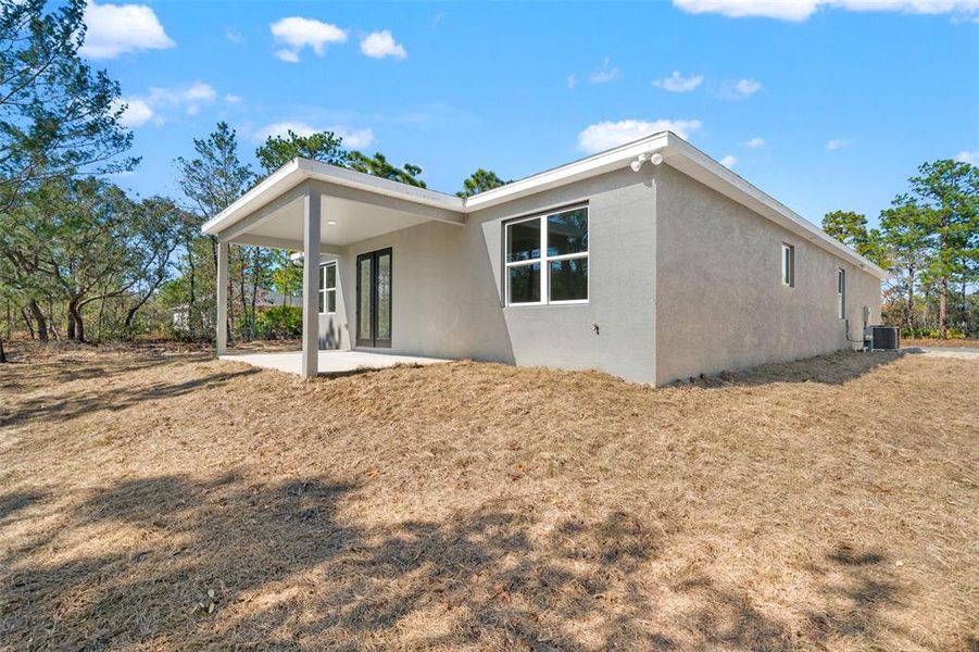 Exterior details and patio area of a home in , Citrus Springs (Image 26).