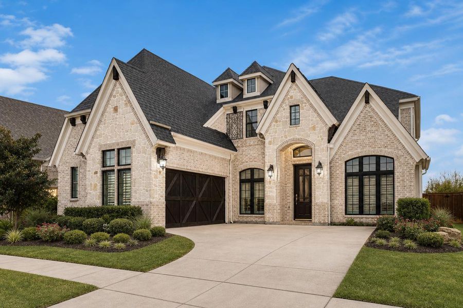 Representative exterior photo of a completed home built from the Grand Lantana by Grand Homes in Cedar Ridge Estates, Grand Prairie, TX (Image 18). Representative exterior photo of a completed home built from the Grand Lantana by Grand Homes in Cedar Ridge Estates, Grand Prairie, TX (Image 18).