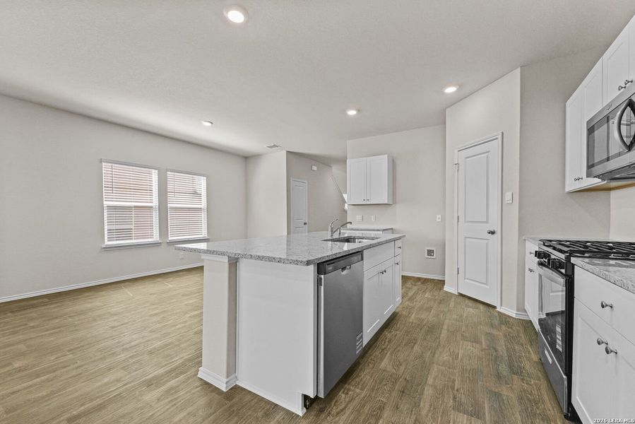 Furnished interior view inside a new home in Hunters Ranch, San Antonio (Image 9).