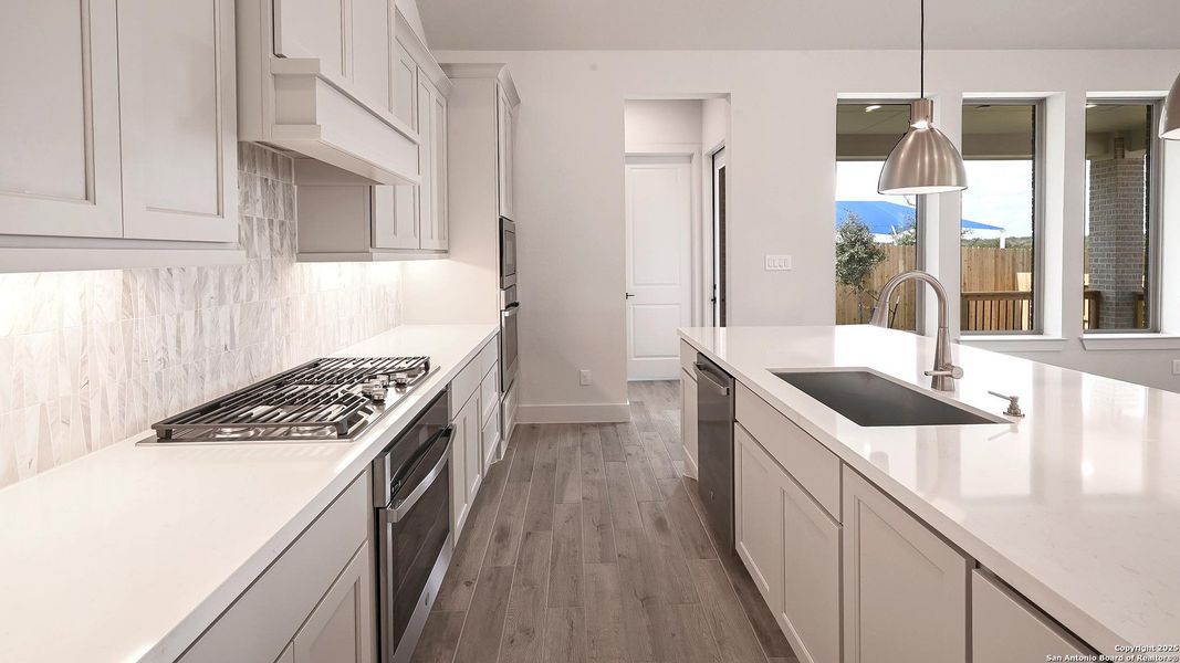 Furnished interior view inside a new home in Cibolo Valley Heights 65', Cibolo (Image 9).