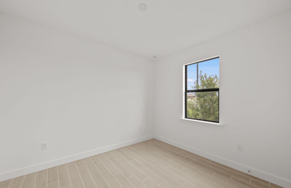 Representative unfurnished interior of a home built from the Concord by DiVosta in Talon Preserve on Palmer Ranch, Nokomis (Image 18).