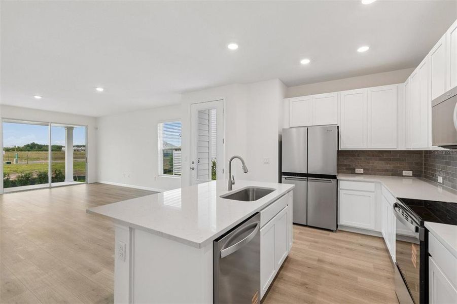 Furnished interior view inside a new home in Waterset Townhomes, Apollo Beach (Image 9).