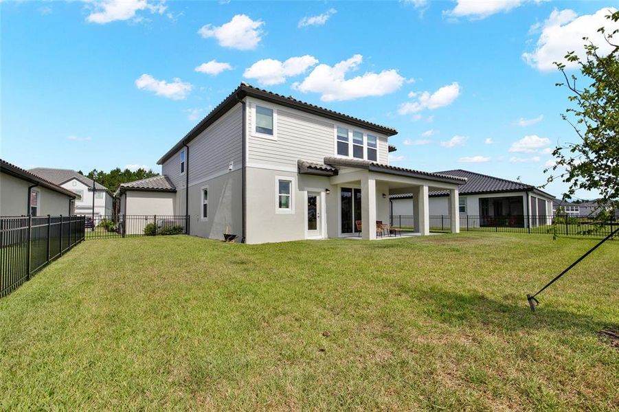 Exterior details and patio area of a home in , Wesley Chapel (Image 32).
