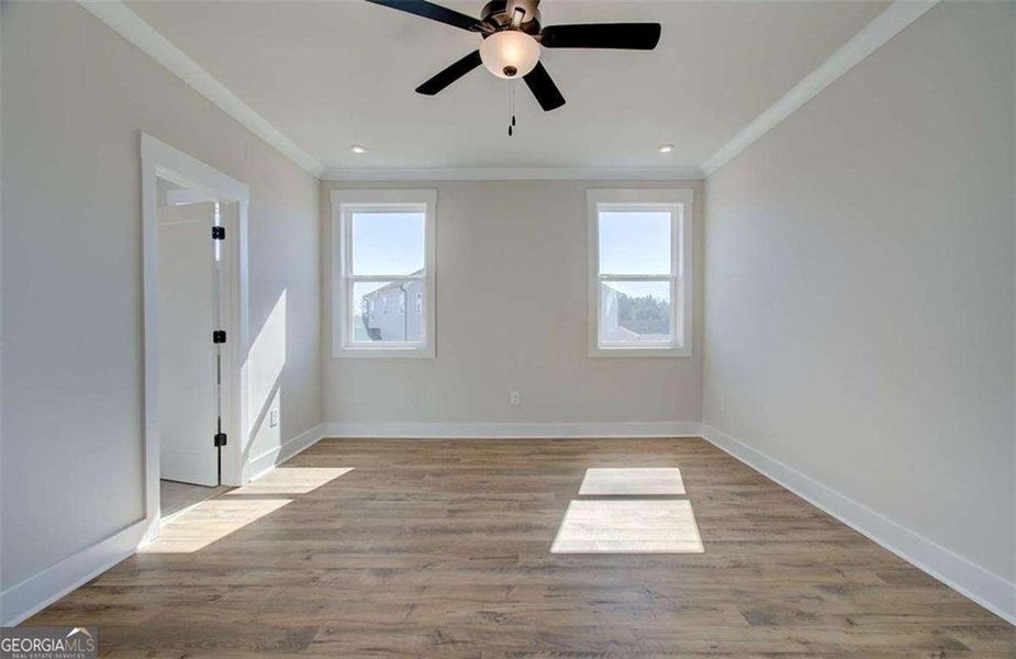 Spacious, unfurnished interior of a new home in The Paddocks at Doc Hughes, Buford (Image 31).