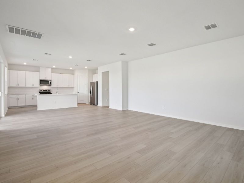 Spacious, unfurnished interior of a new home in Coasterra - Reserve Series, Palmetto (Image 8).