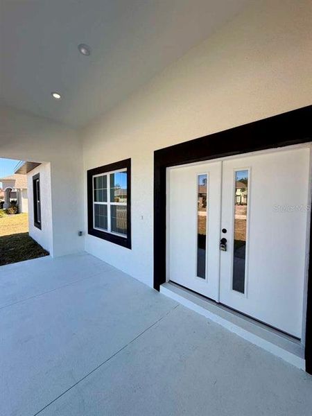 Exterior details and patio area of a home in , Sebring (Image 19).