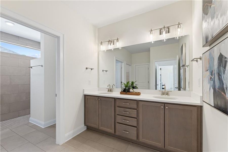 Furnished interior in a model home at The Courtyards by The Manor in Alpharetta (Image 25).