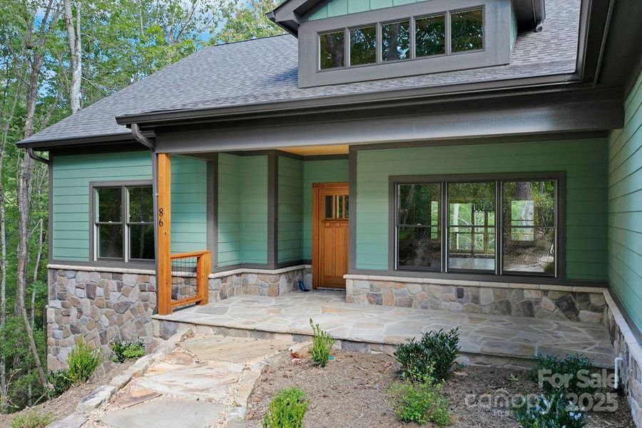 Front exterior of a new home in , Brevard, NC, highlighting curb appeal (Image 2).