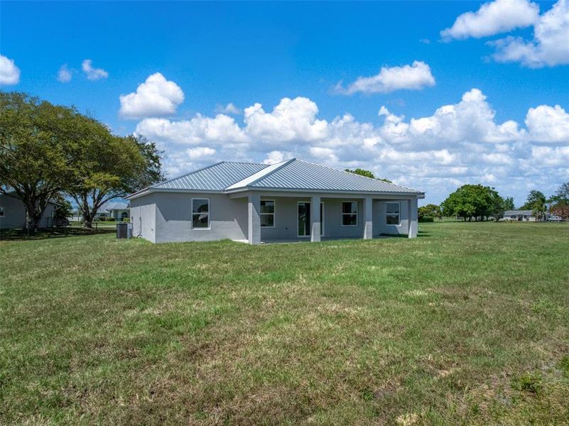 Exterior details and patio area of a home in , Sebring (Image 3).