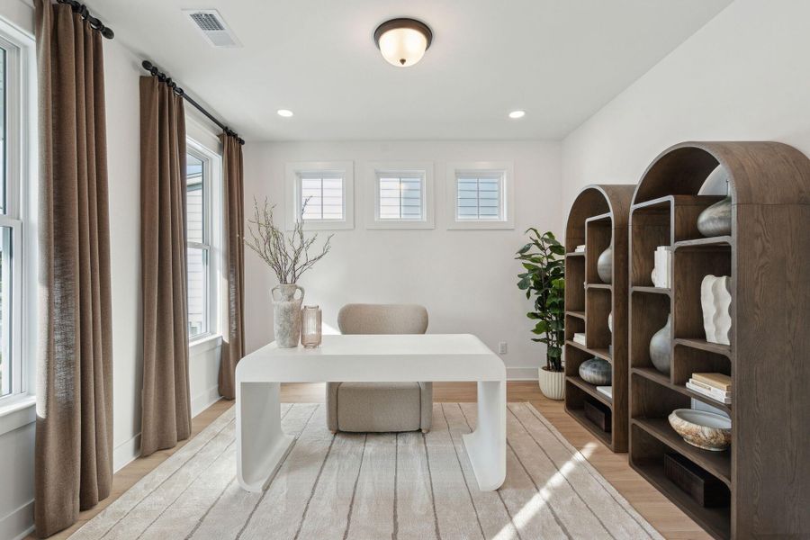 Furnished interior view inside a new home in Tidewater at Lakes of Cane Bay, Summerville (Image 22).