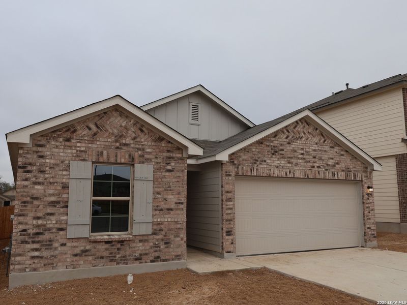 Front exterior of a new home in Agave, San Antonio, TX, highlighting curb appeal (Image 19).