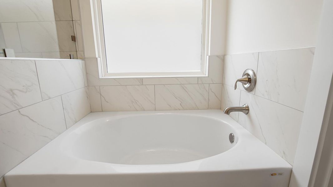 Representative furnished interior of a home built from the Camellia by D.R. Horton in Breakfast Point East Phase II, Panama City Beach (Image 12).