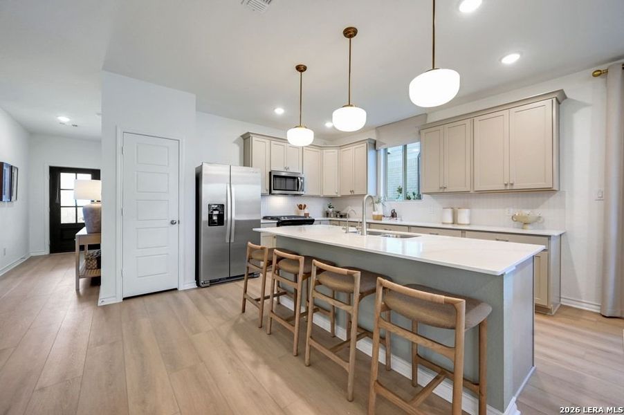 Furnished interior view inside a new home in Nopal Valley, San Antonio (Image 6).