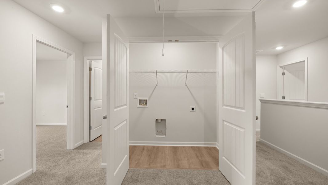 Representative unfurnished interior of a home built from the Sudbury by D.R. Horton in Hughes Court, Dawsonville (Image 27).
