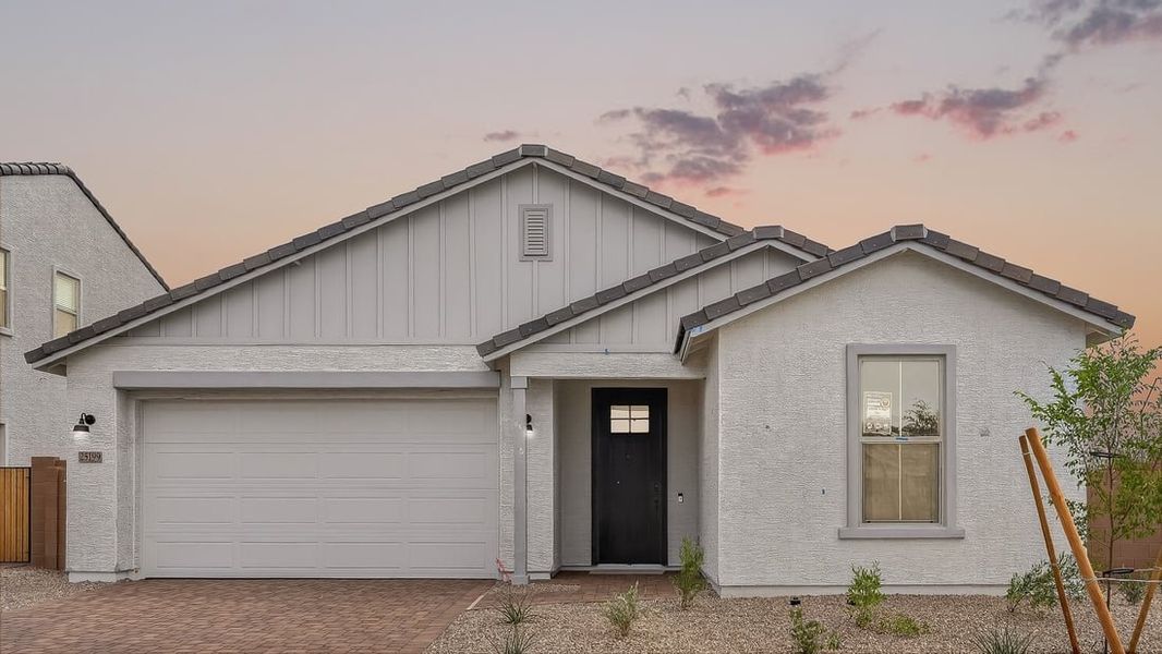 Representative exterior photo of a completed home built from the Origin by Taylor Morrison in Artisan at Asante, Surprise, AZ (Image 17).