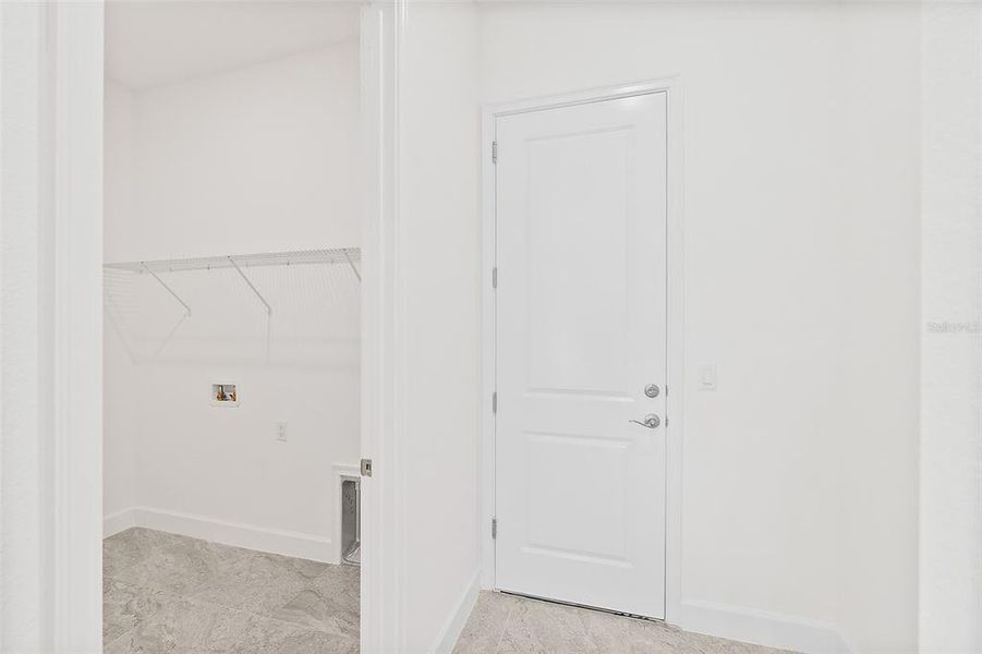 Utility Room & Door to Garage