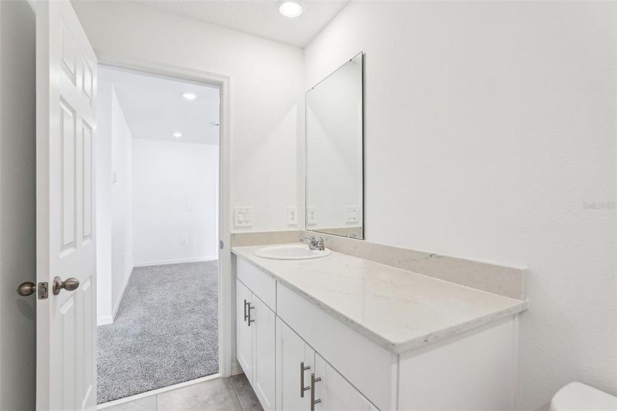 Furnished interior view inside a new home in Lake Deer Estates - Signature Series, Poinciana (Image 13). Furnished interior view inside a new home in Lake Deer Estates - Signature Series, Poinciana (Image 13).