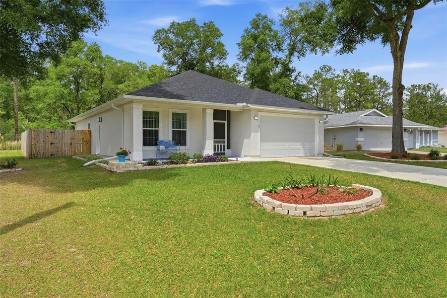 Front exterior of a new home in , Silver Springs, FL, highlighting curb appeal (Image 22).