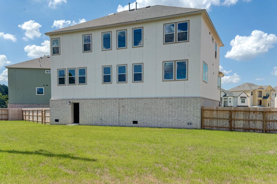 Front exterior of a new home in Townsen Landing, Humble, TX, highlighting curb appeal (Image 16).