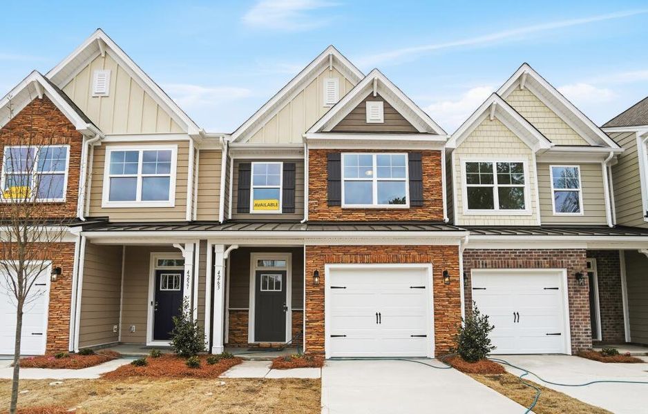 Front exterior of a new home in Harrisburg Village Townhomes, Harrisburg, NC, highlighting curb appeal (Image 2).