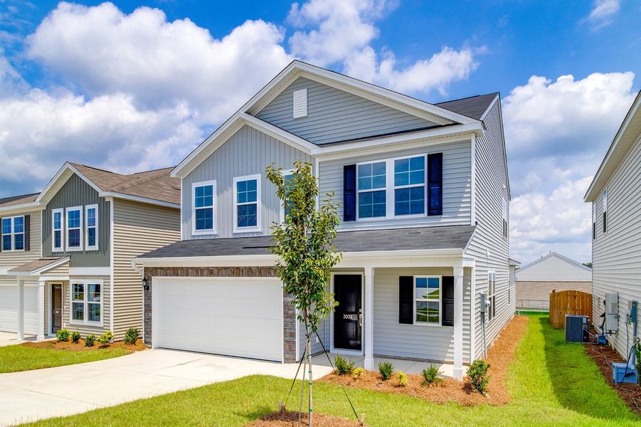 Front exterior of a new home in Ellington, Elgin, SC, highlighting curb appeal (Image 21).