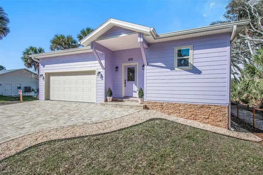 Exterior details and patio area of a home in , Flagler Beach (Image 4).