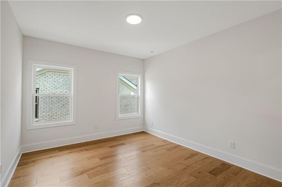Spacious, unfurnished interior of a new home in Bellwyn, Johns Creek (Image 46).